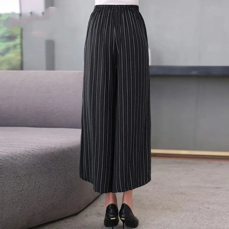 Женские длинные брюки с цветочным принтом весенне-летние из хлопка и льна