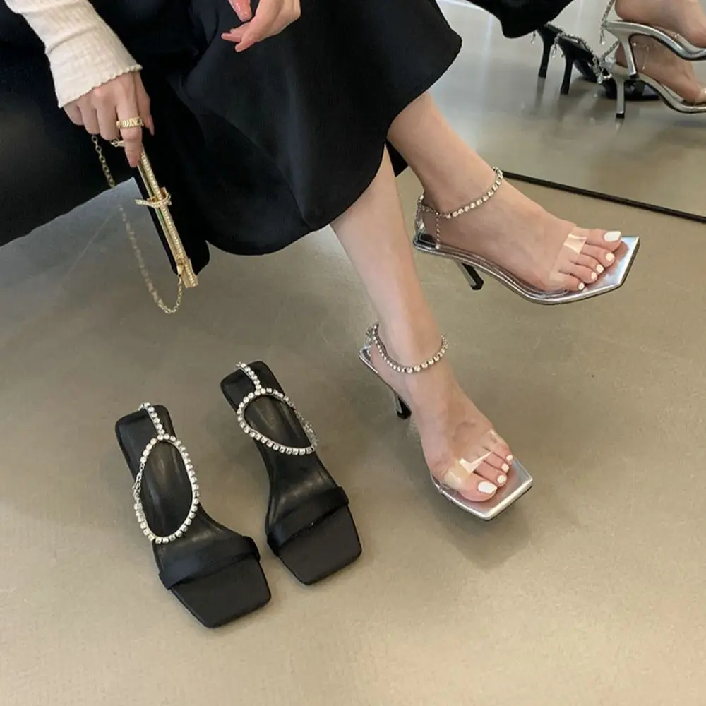 

PVC Women Sandals Rhinestone Chain Thin High Heels Black Silver Fashion Party Pumps Summer Sandals Ankle Strap Ladies Jelly Shoe