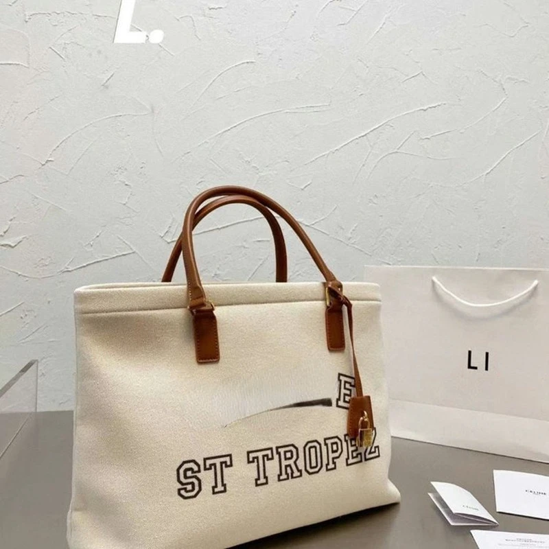 

2022 Luxury Brand Ladies Fashion Canvas Large Capacity Tote Bag 2022 New Famous Designer Fashion Tote Bag With Lock Decoration
