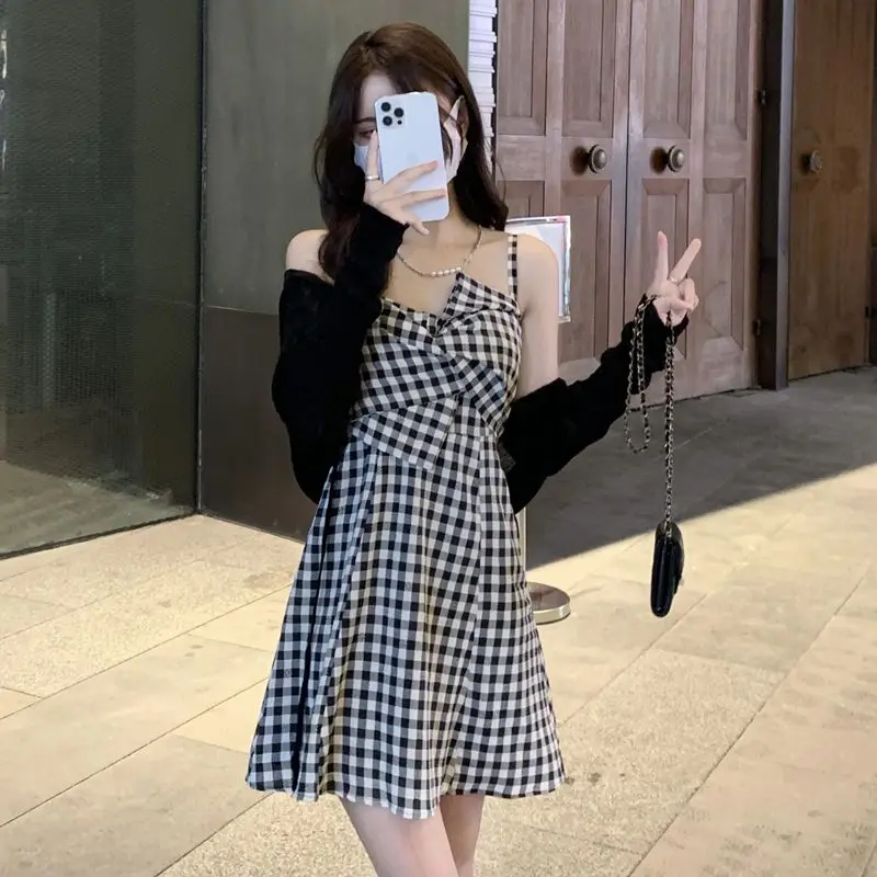 

French knotted plaid camisole dress 2023 new irregular wind waist thin A word hem dress