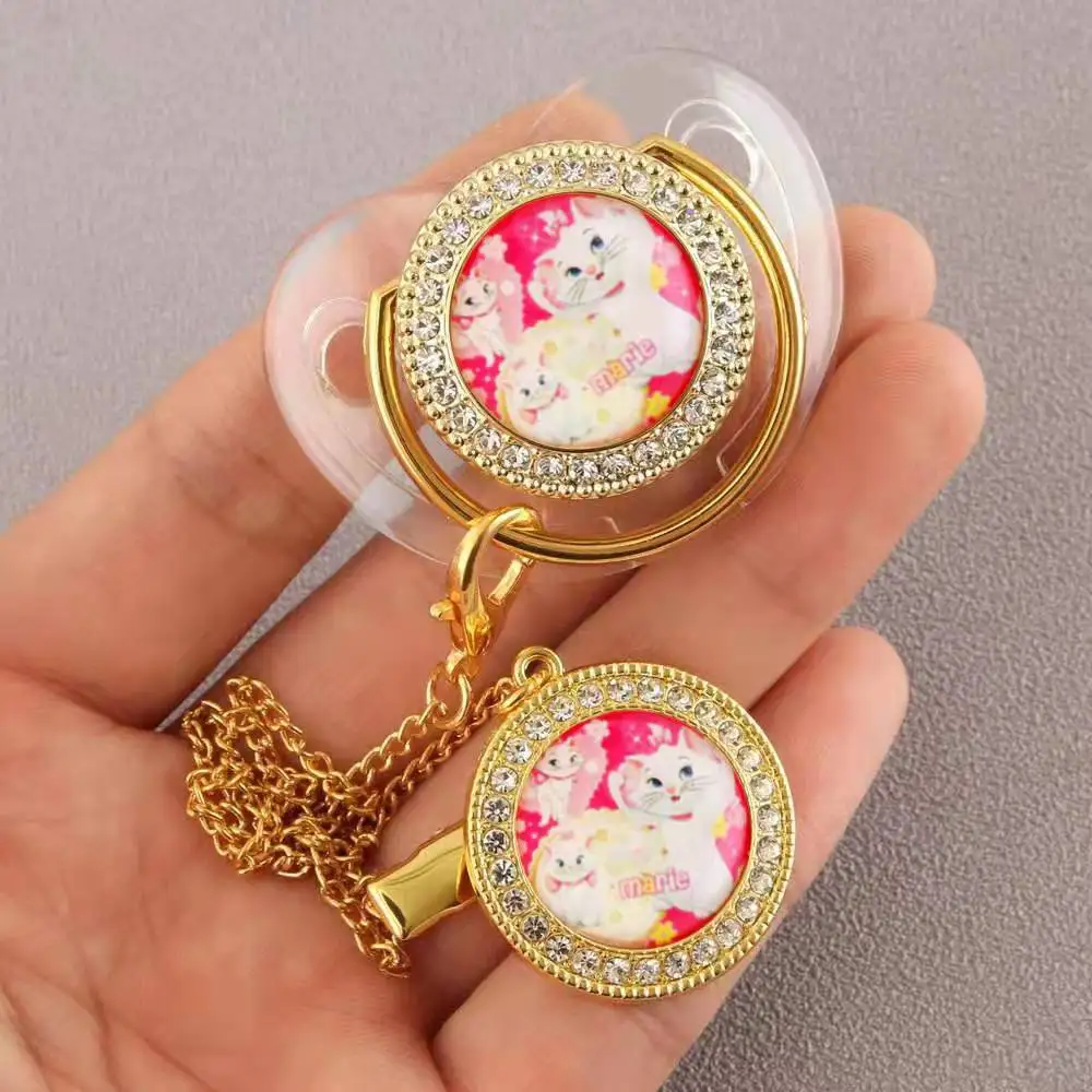 

[1 set] New transparent golden cartoon hot-selling baby pacifier baby point drill to comfort the mouth silicone weaning artifact