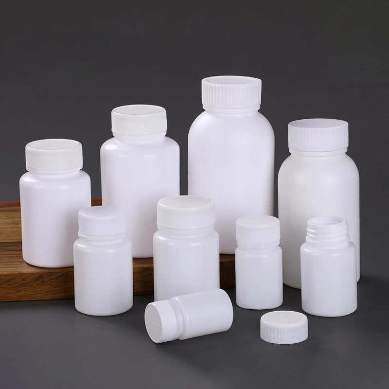 

100PCS 15ml/20ml/30ml/60ml/100ml Plastic PE White Empty Seal Bottles Solid Powder Medicine Pill Vials Reagent Packing Containers
