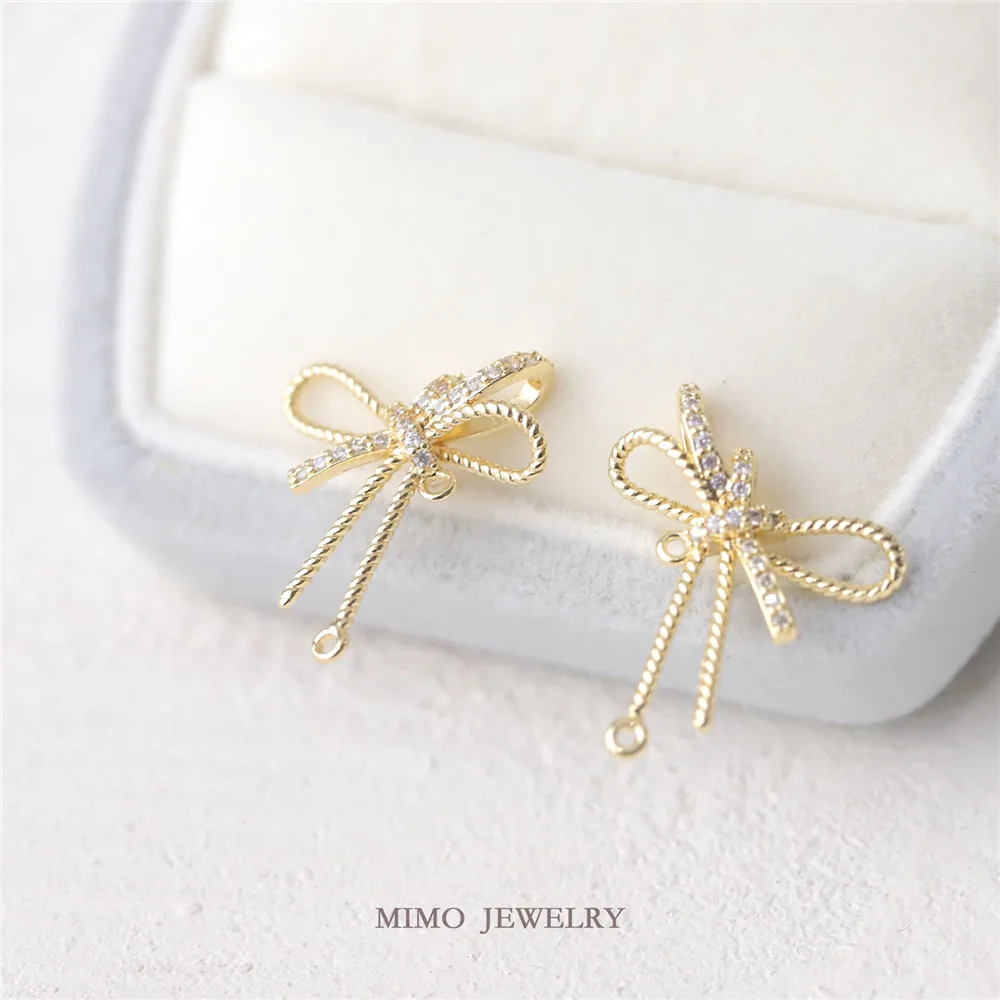 

Copper plated gold micro-inlaid zircon asymmetrical smart bow 925 silver needle semi-finished ear stud