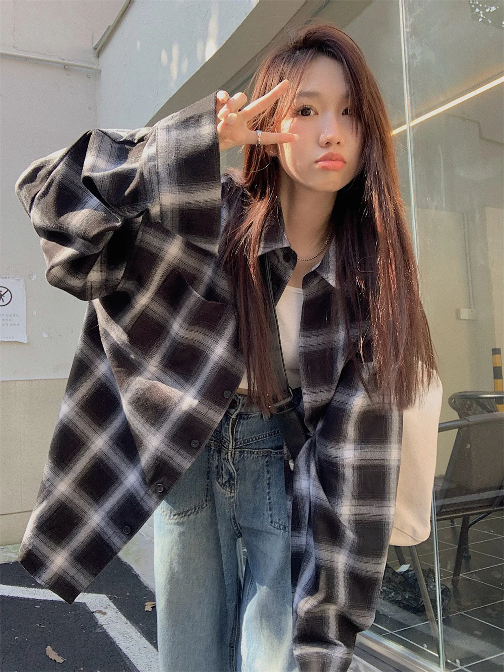 

The new Korean of the fashion retro plaid loose long-sleeved shirt women