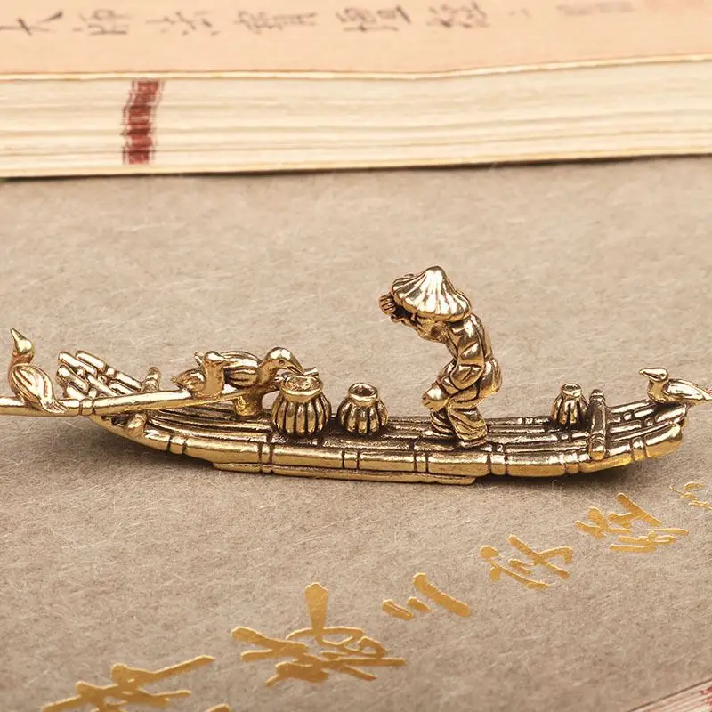 Антикварная статуэтка медного баклана