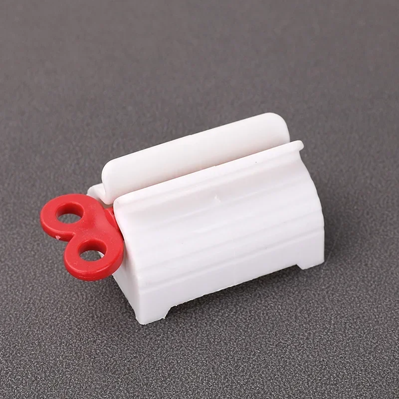 

Пластиковый роликовый диспенсер для зубной пасты