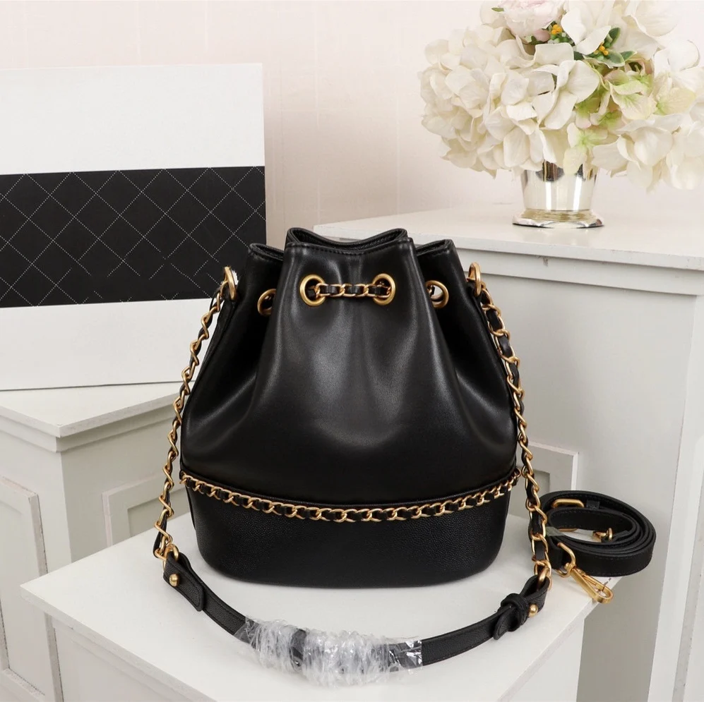 

New classic fashion women's leather black white blue beige gold chain women's bag bucket bag drawstring bag