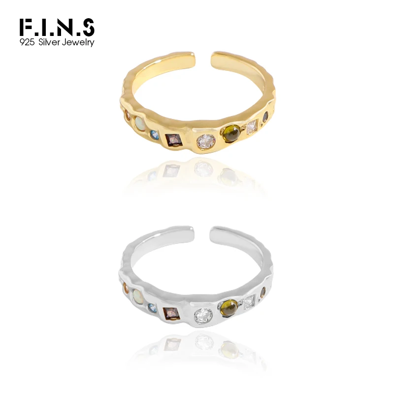 

Кольцо из серебра пробы с фианитом и опалом