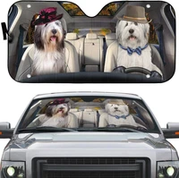 old english sheepdog dog happy couple in hat left hand drive car sunshade old english sheepdog couple driving on highway auto s