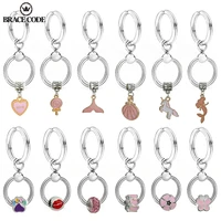 brace code silver colour keychain with gold mermaid delicate pendant women handbag clothing car brand keyring gift party favors