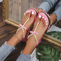 2022 summer fashion pinch toe sandals new flat bottom pearl bow decoration elastic belt beach flip flops sandalias de tacon