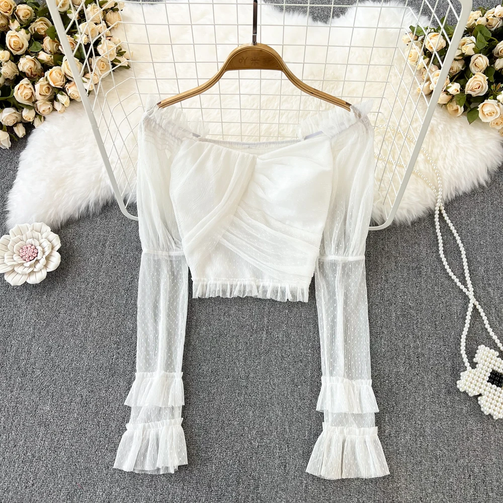 

Корейская версия сексуальной Спайс девушки на одно плечо с открытыми плечами расклешенный рукав сетка Тонкий однотонный короткий топ