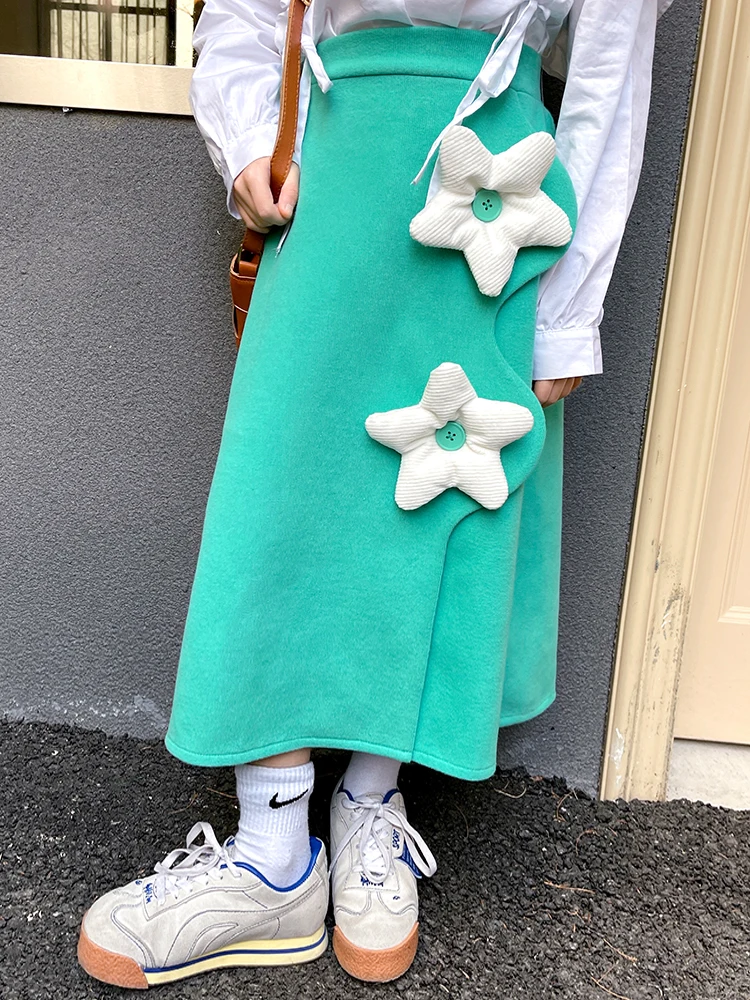 

Girls' green skirt 2022 spring new children's leisure three-dimensional flowers niche Western style heavy industry A-line skirt