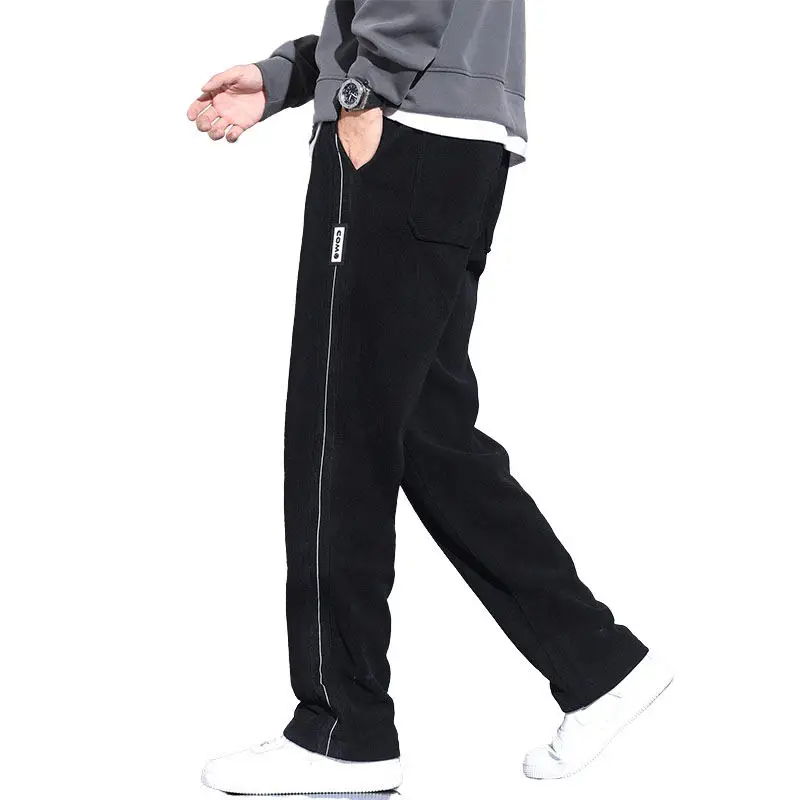 Тяжелые спортивные мужские брюки на осень и зиму утепленные повседневные с