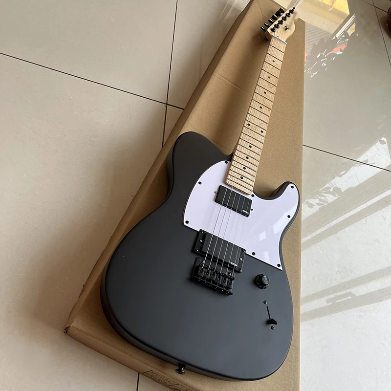 

Famous electric guitar, quality lock button, matte black surface, professional performance level, free delivery to home.