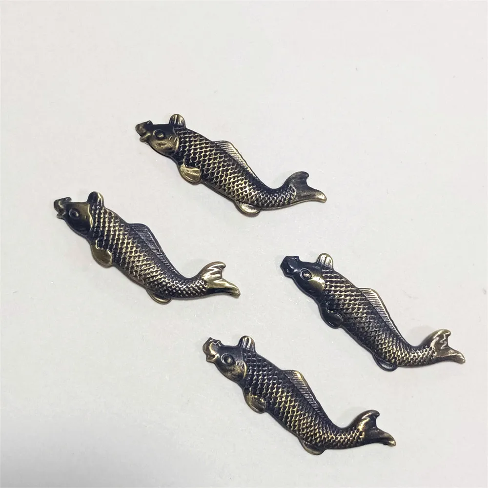 Латунные рыбки менуки для рукоятей мечей 4 шт тройка мечей скорбь детективная повесть