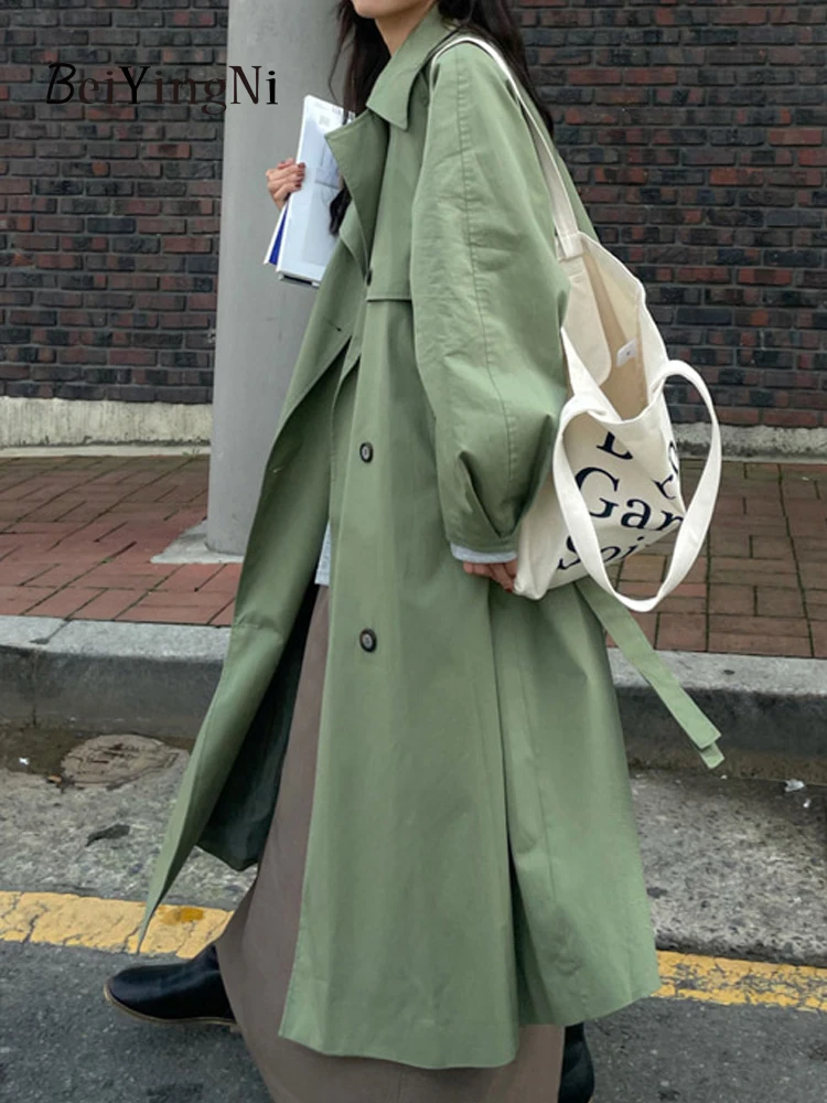 

Женская осенне-зимняя длинная куртка с поясом