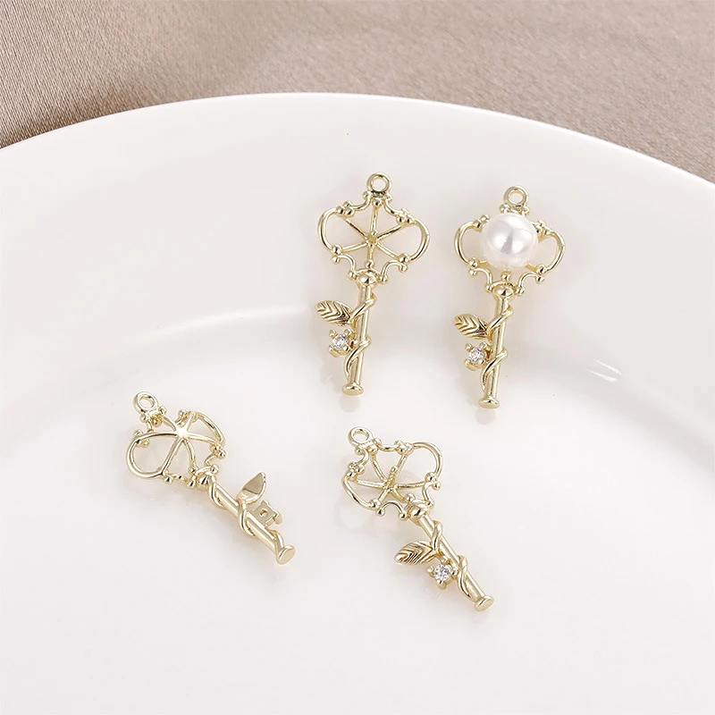 

2pcs copper clad 14K gold inlaid zircon hollowed out flower vine key pendant DIY hand jewelry necklace accessories material