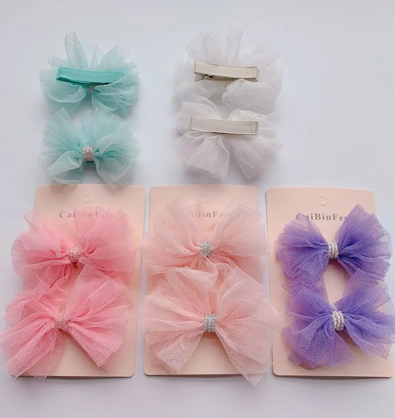 

Children's new bowknot cute net with beads simple and fashionable press clip
