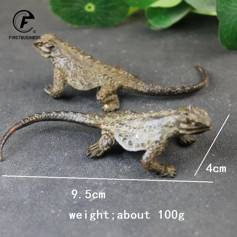 

Медная статуэтка ящерицы