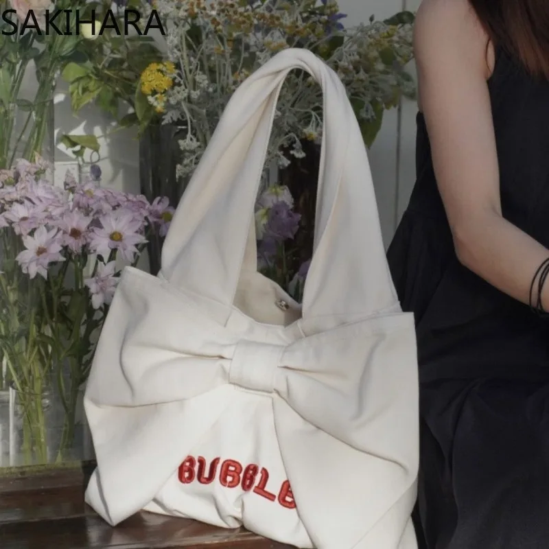 

2023 New Arrive Bow Solid Color Large Capacity Letter Embroidery Tote Bags for Women Kpop Minimalist Versatile Shoulder Bag
