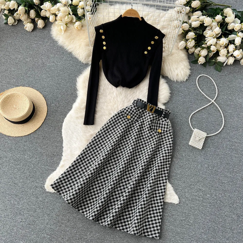 

Autumn and Winter New Knitted Row Button Half High Collar Sweater + Retro Plaid A Word Tweed Half Body Skirt Two-piece Set