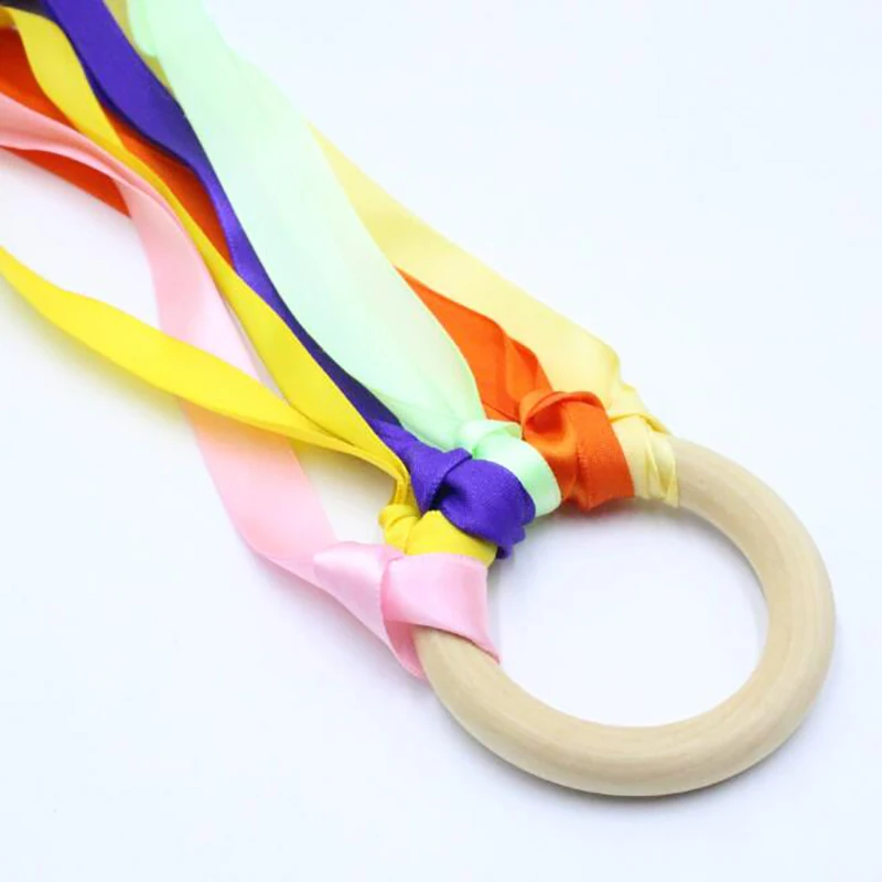 

Rainbow Color Ribbon Wooden Ring Waldorf Ribbon With Bell Hand Kite Toy Rainbow Streamers Baby Toy Sports 2022