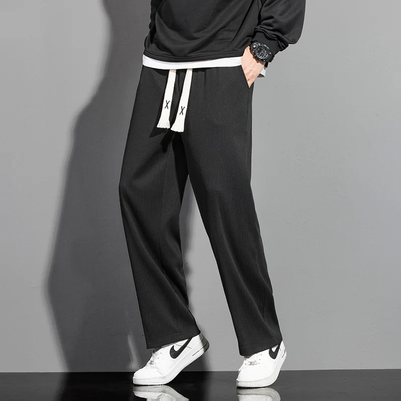 

New fashion Korean design casual pants for men fashionable style sports pants and trousers
