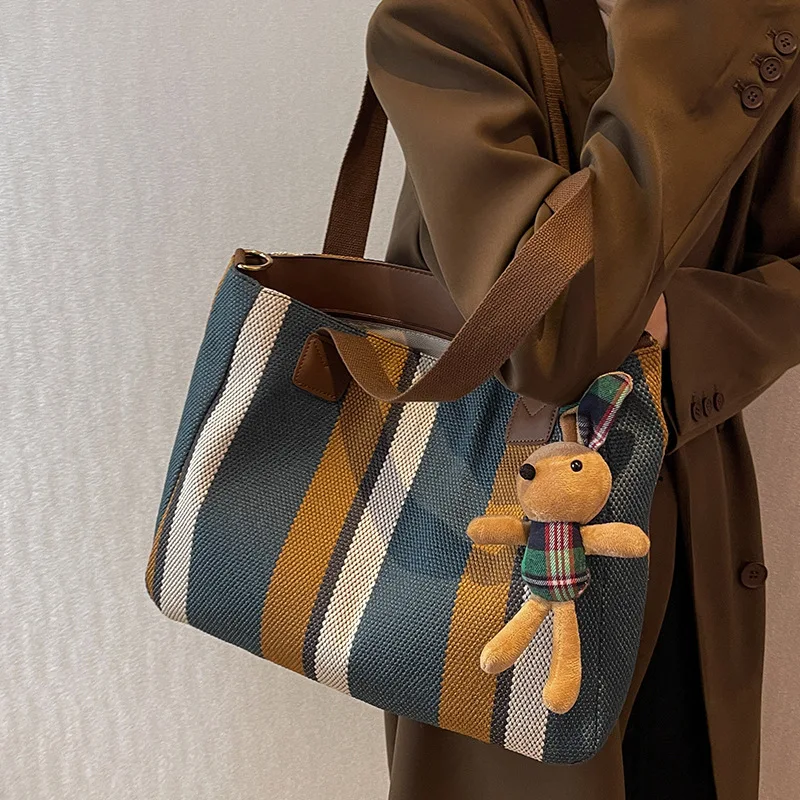 

Fashion Stripe Canvas Bag Mommy Outgoing Shoulder Bag