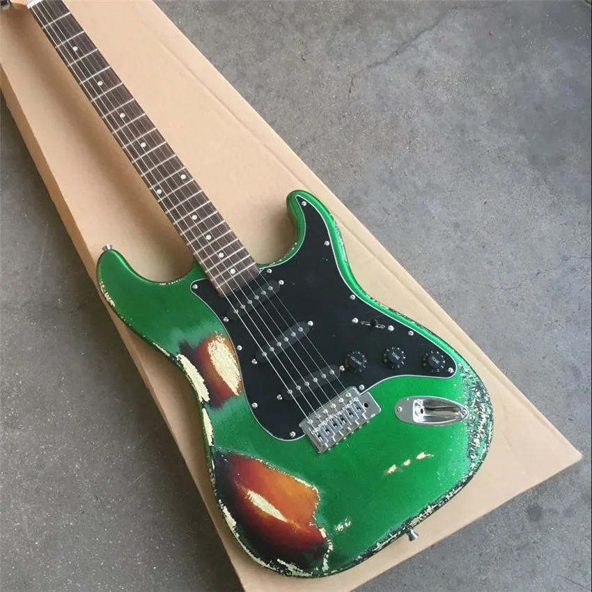 

Antique relic electric guitar, metal green, black guard, cow bone string pillow, real photos, free shipping, wholesale and retai