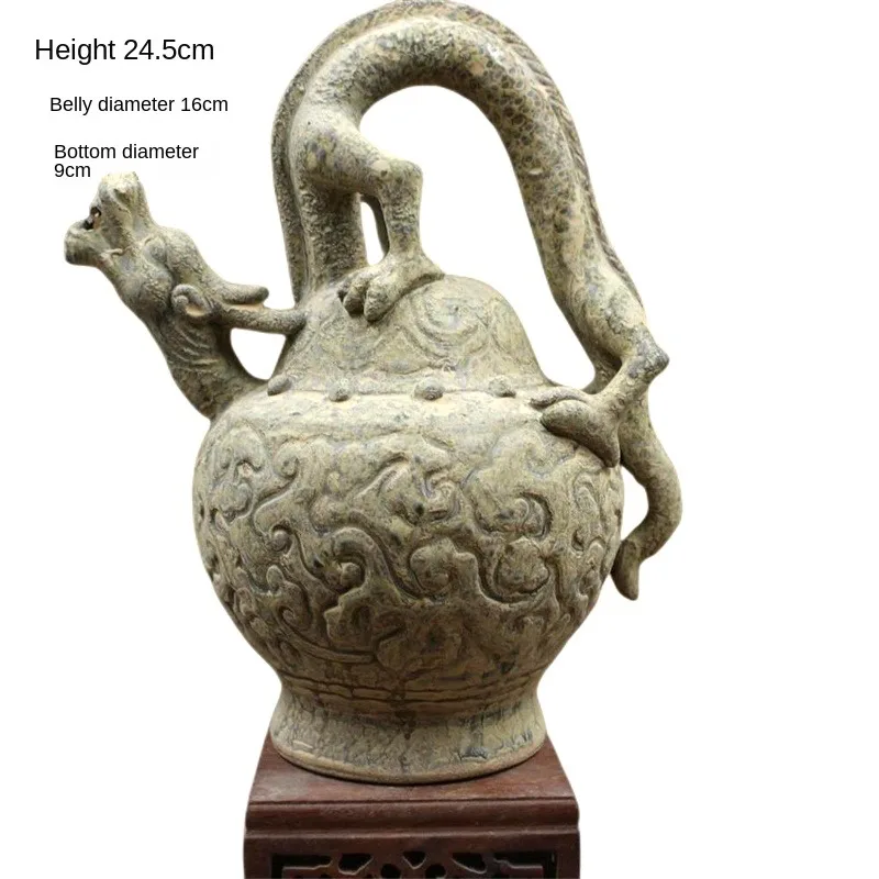 

Фарфор Селадон с гравировкой в виде головы дракона