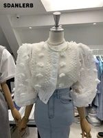 womens clothing 2022 spring and summer new design sense round neck tops buckle flower sweet puff sleeve short shirt tide