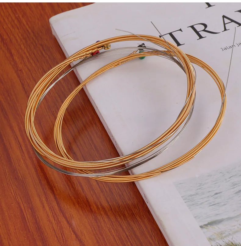 

Струны для электрогитары, набор струн для акустической гитары, один комплект из 6 струн Из бронзового материала, полностью яркий тон, дополн...