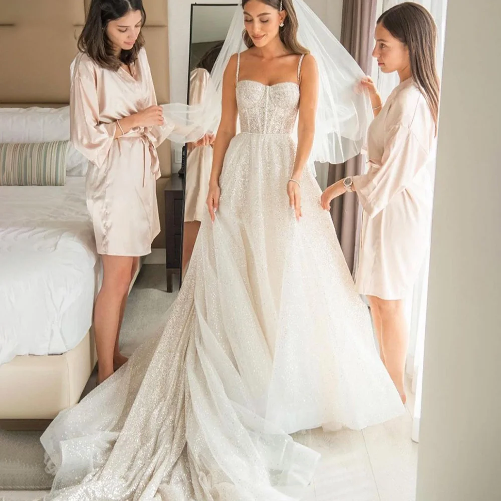

Glitter Exquisite Wedding Dresses 2022 Sweetheart Sleeveless Tulle Dress A-Line Sequined Backless Spaghetti Straps Bridal Gowns