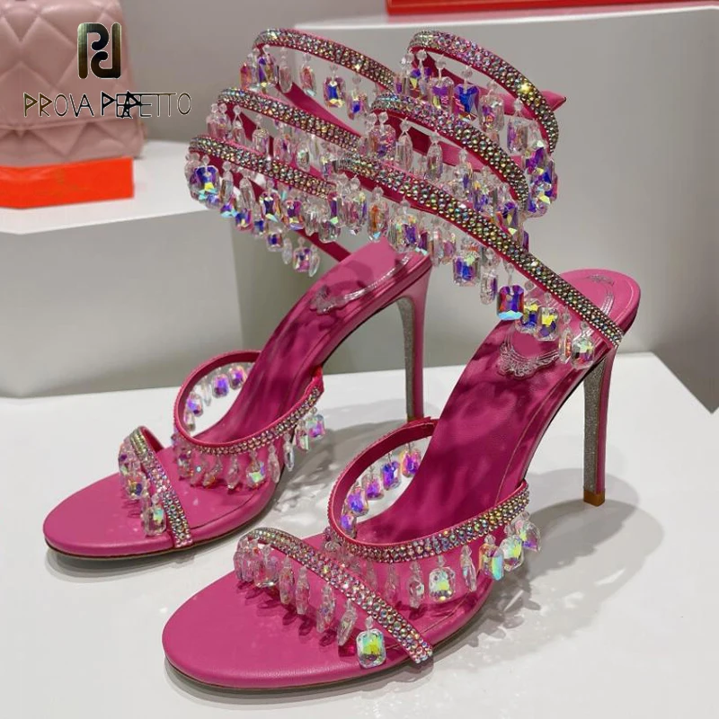 

Женские босоножки из натуральной кожи, с кристаллами и змеиным принтом