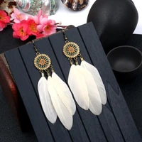 wholesale fashion popular retro sunflower earrings feather tassel womens holiday day