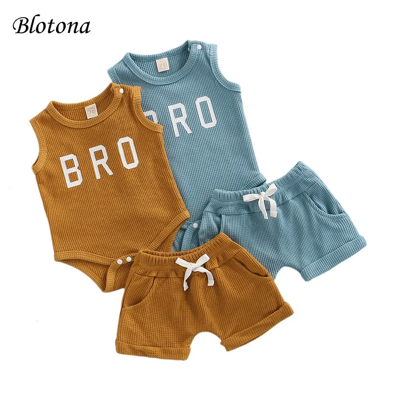 

Blotona Toddler Girls Boys Summer Outfits Sleeveless Letter Print Romper + Solid Color Drawstring Shorts, 0-18Months
