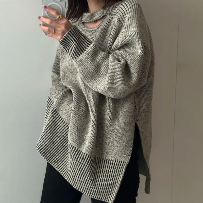 Женский трикотажный свитер с разрезом спереди и сзади длинным рукавом