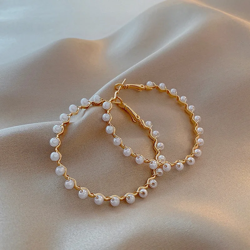 

S925 silver needle earrings women's Korean earrings premium round face 2022 pearl tide new product women's wave temperament