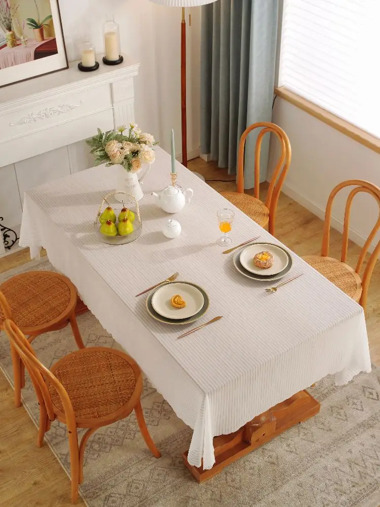 

Table cloth is light and luxurious, with a high-end feel. White rectangular and minimalist fabric cushion table cloth