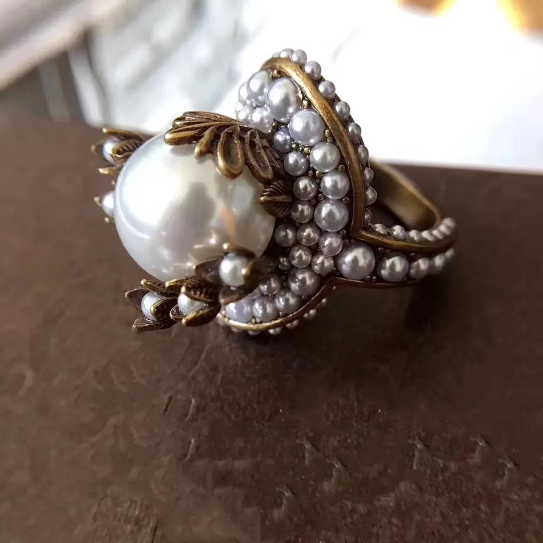 

Fashion personality vintage pearl vine petal ring