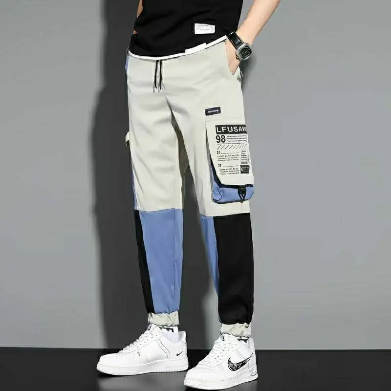 Брюки-карго мужские эластичные с карманами и надписью