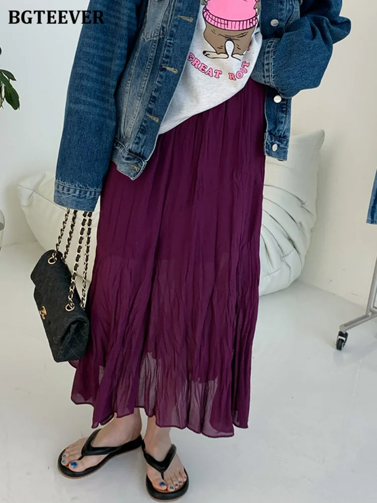 

Женская шифоновая юбка с высокой талией и разрезом