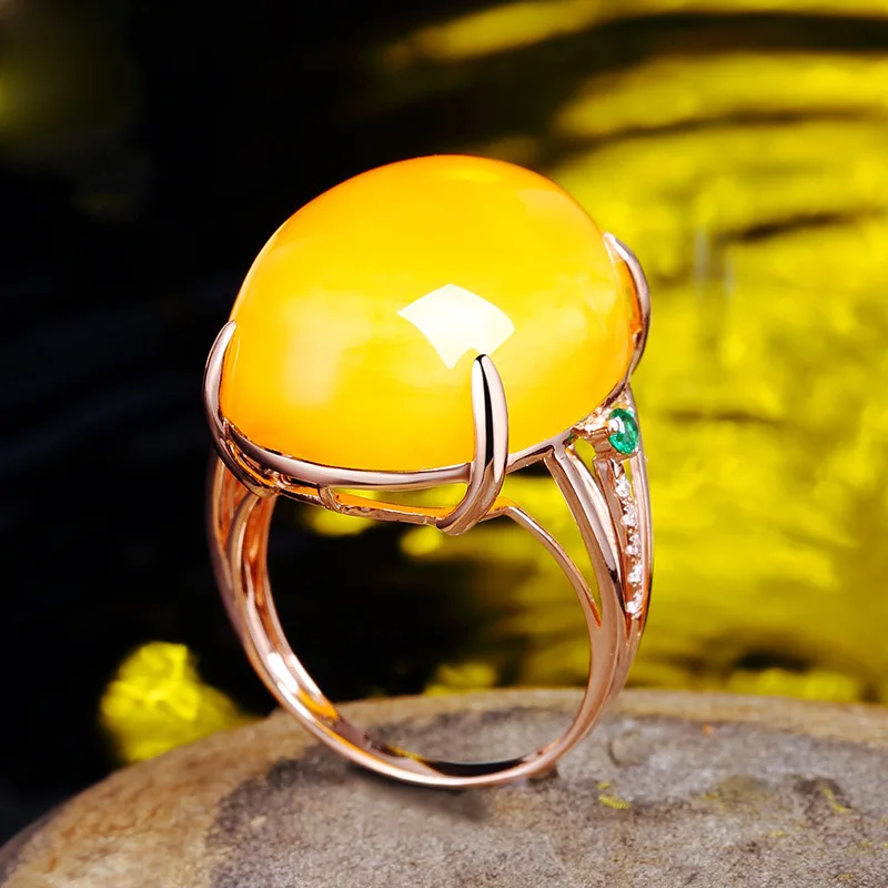 

Hot Selling 18k Rose Gold Plated Imitation Beeswax Ring Women's Gold Inlaid Chicken Oil Yellow Amber Zircon Ring