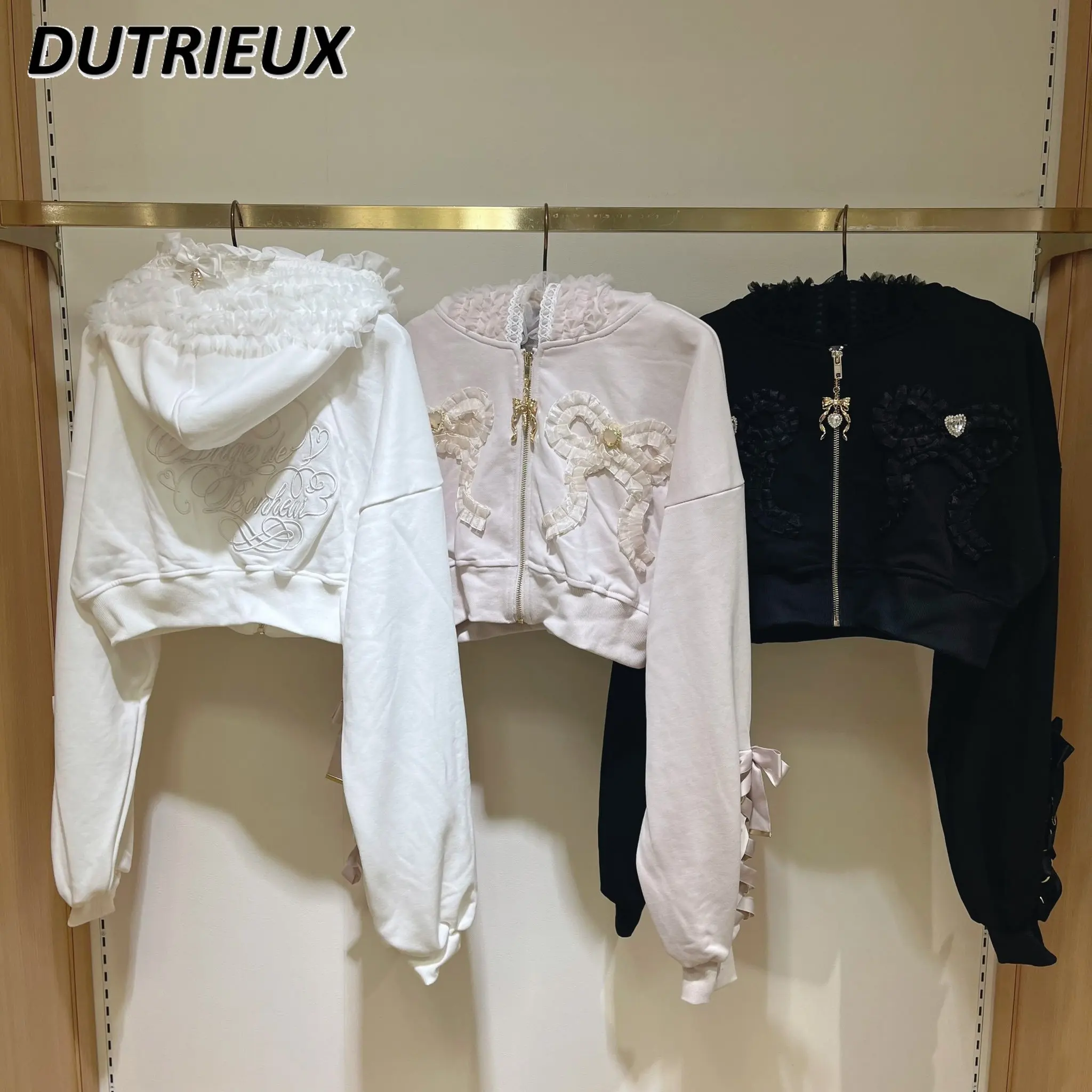 Женская толстовка со стразами и бантом