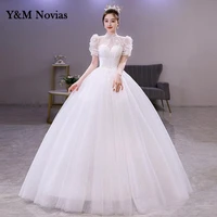 ym novias new light wedding dress puff sleeve high neck luxury lace appliques bead sequined dream bride gown plus size illusion
