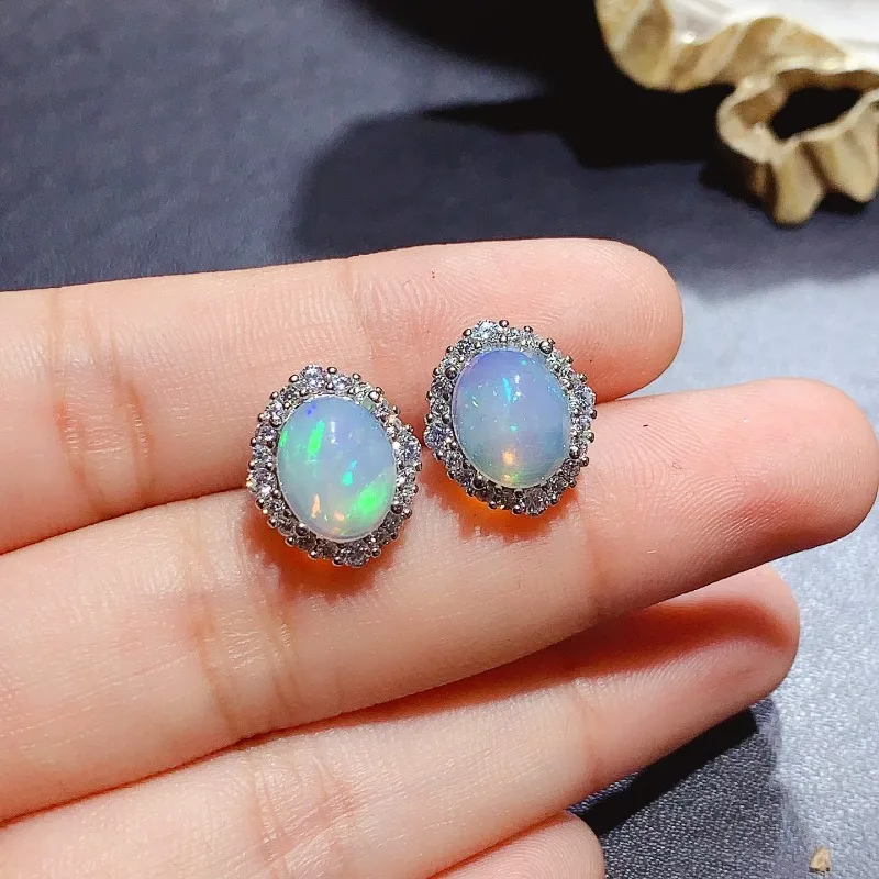 Женские серьги с белым опалом серебро 100% пробы 10 мм х 8