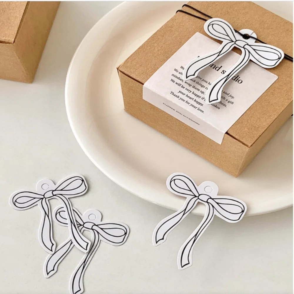 

Персонализированные подарочные бирки с розовым бантом