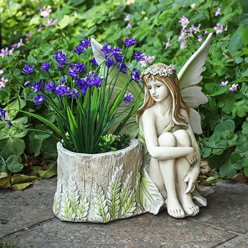 

Indoor and Outdoor Decorative Resin Flower Plant Pot with Fairy Statue