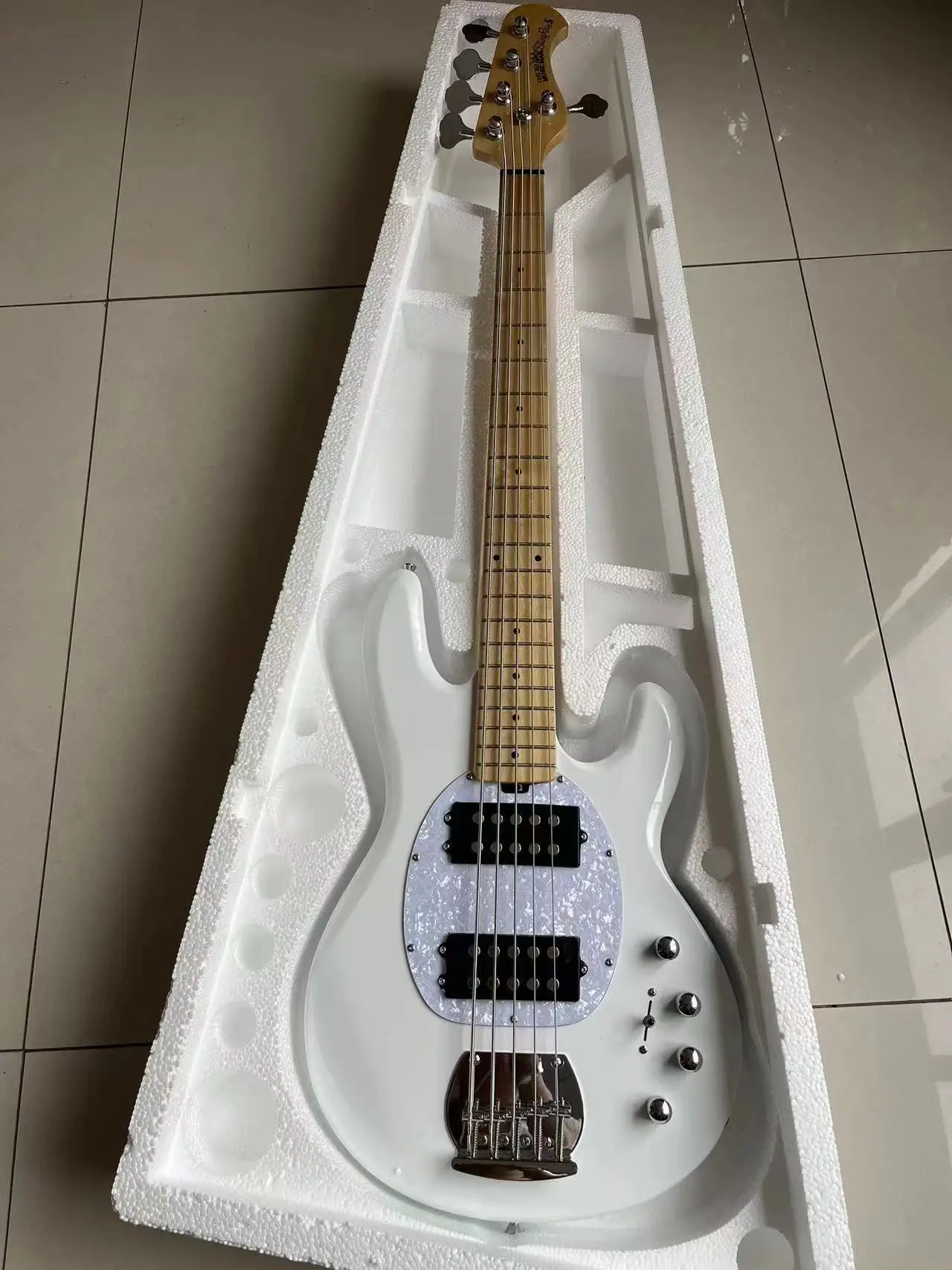 

Wholesale White Music Man 5 Strings Electric Bass guitar with initiative to pickups 9V battery guitar 11121